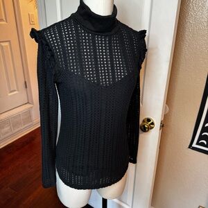 June & Hudson black textured open knit turtleneck blouse ruffle sleeve shoulder